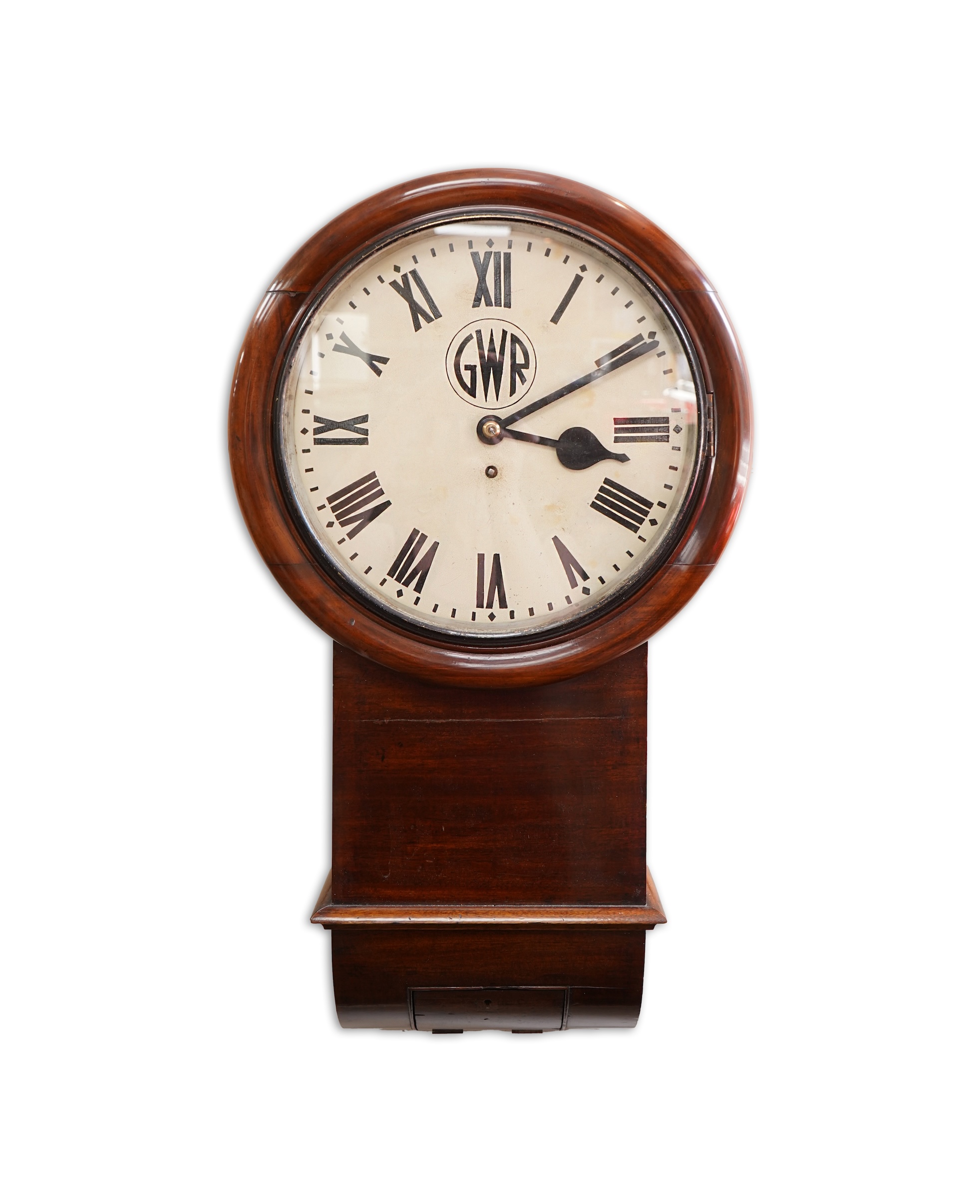 A GWR drop dial railway wall timepiece with fusee movement in a mahogany case, painted 12” dial with ‘shirt button’ GWR monogram and an ivorine plaque pinned to the lower left side of the case engraved with ‘GWR 3746’